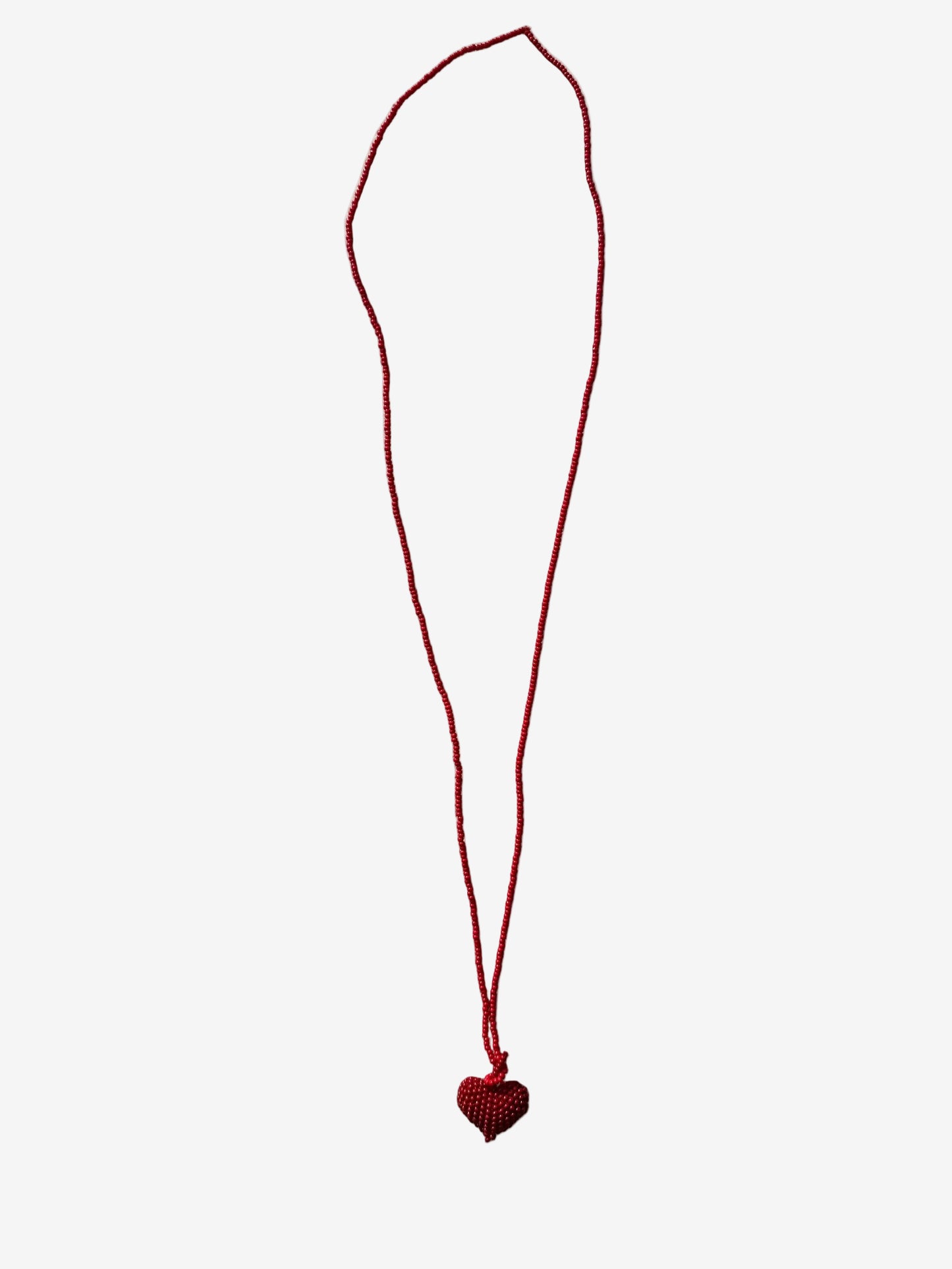 Heart Crimson necklace detail showing monochrome red beadwork and handmade heart design