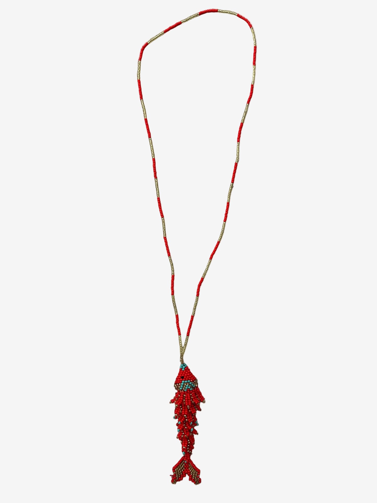 Coral drift fish necklace showing turquoise accents and textured beadwork