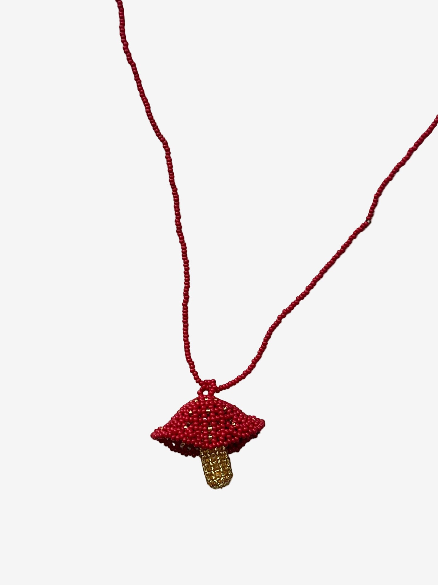 Red and gold fungi necklace handmade by Guava
