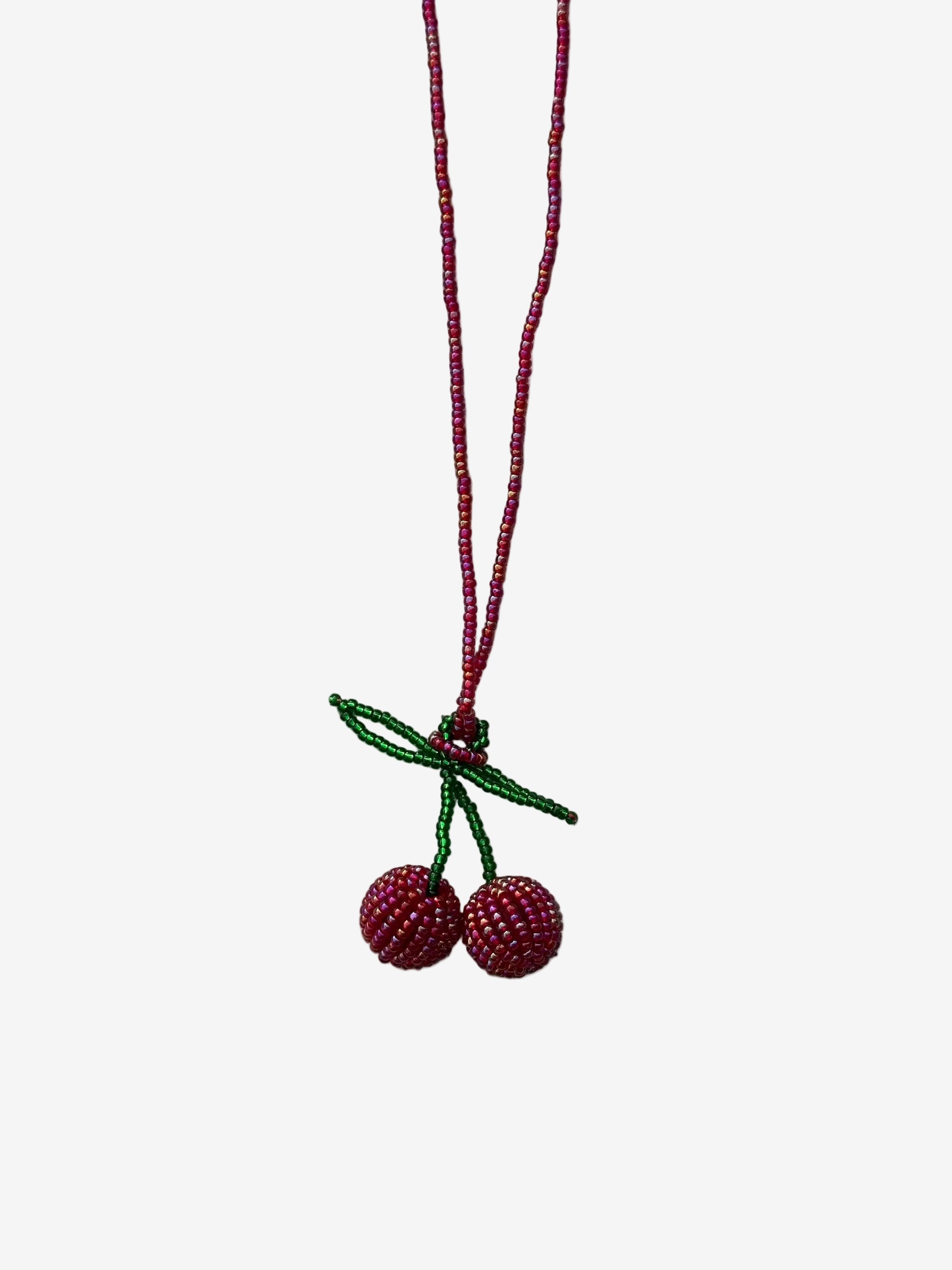 Gloss cherry necklace with bright red beaded chain and shiny cherry pendant front view