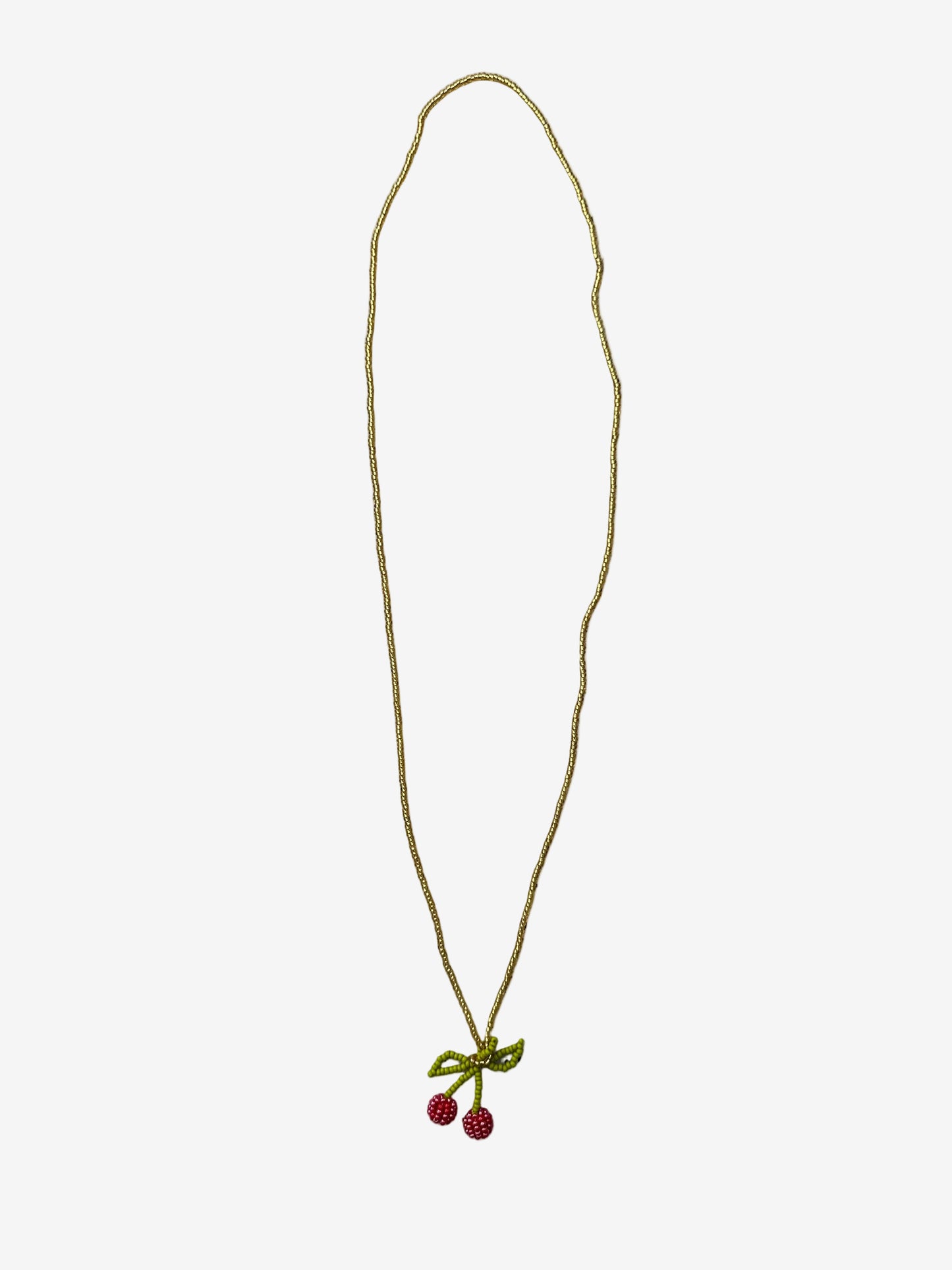 Bright red cherry necklace with gold chain showing beadwork detail and structure
