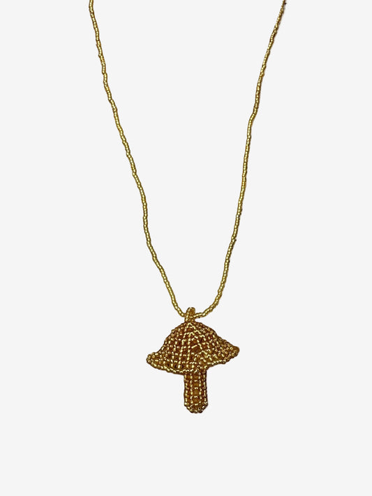 Golden beaded fungi necklace handmade by Guava