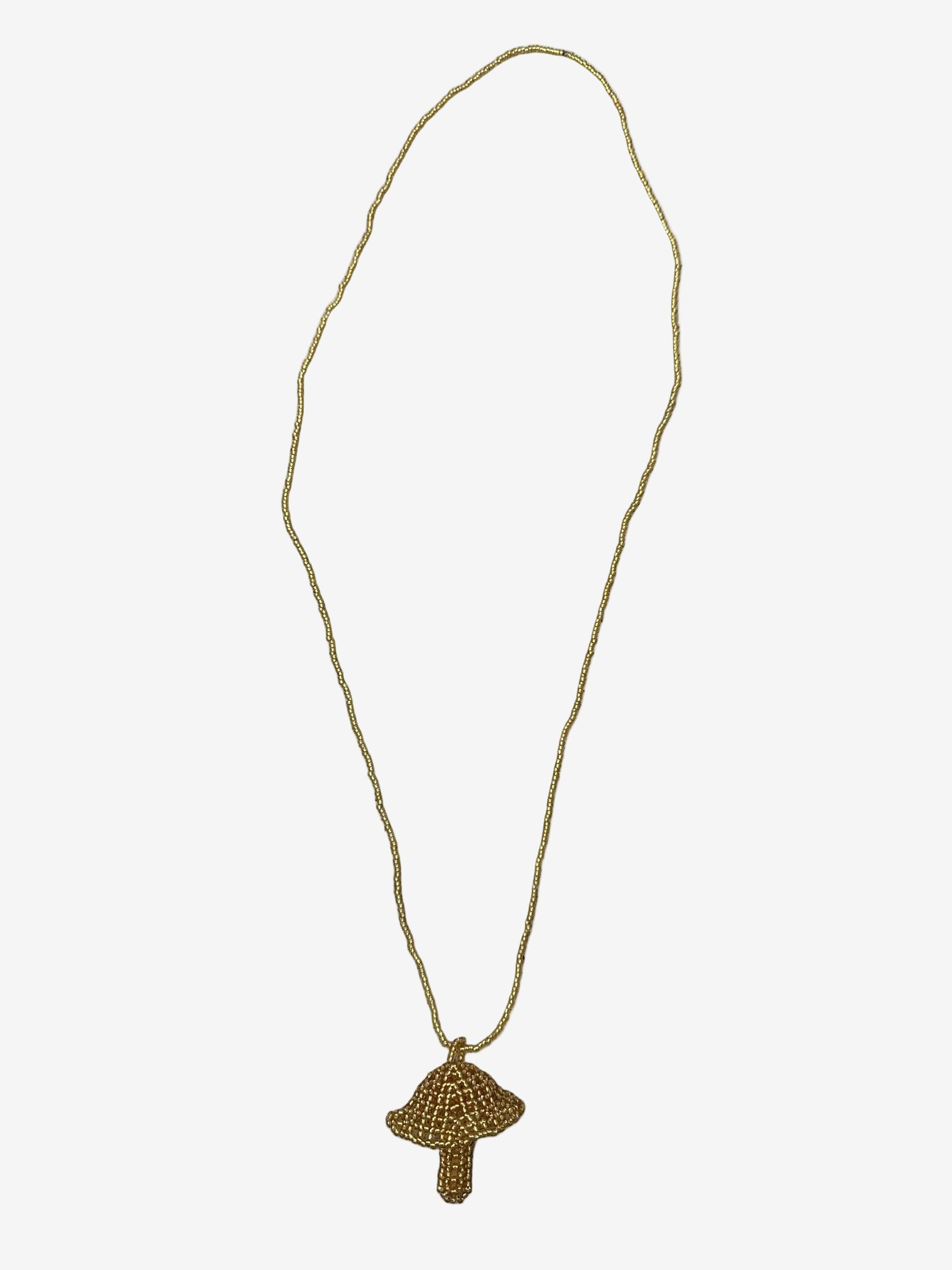 Golden fungi necklace showing handmade bead detail