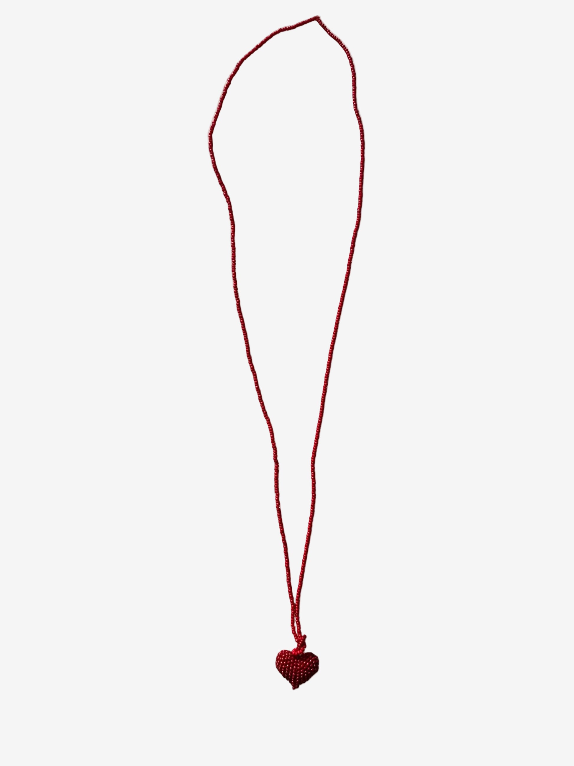 Heart Crimson necklace detail showing monochrome red beadwork and handmade heart design