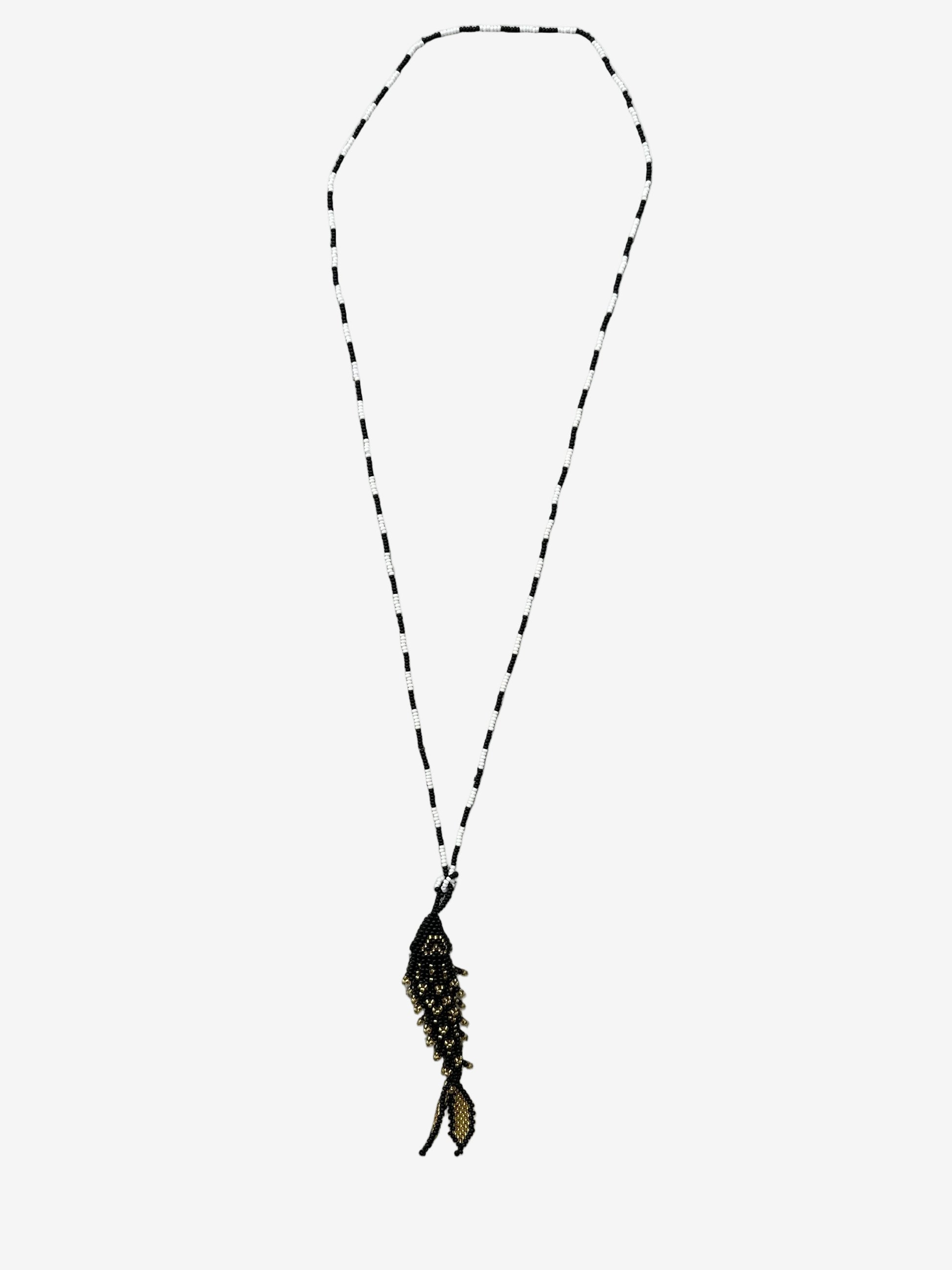 Obsidian drift fish necklace showing detailed beadwork and gold accents