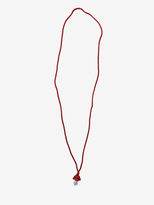 Rubycap mini fungi necklace showing handmade bead detail