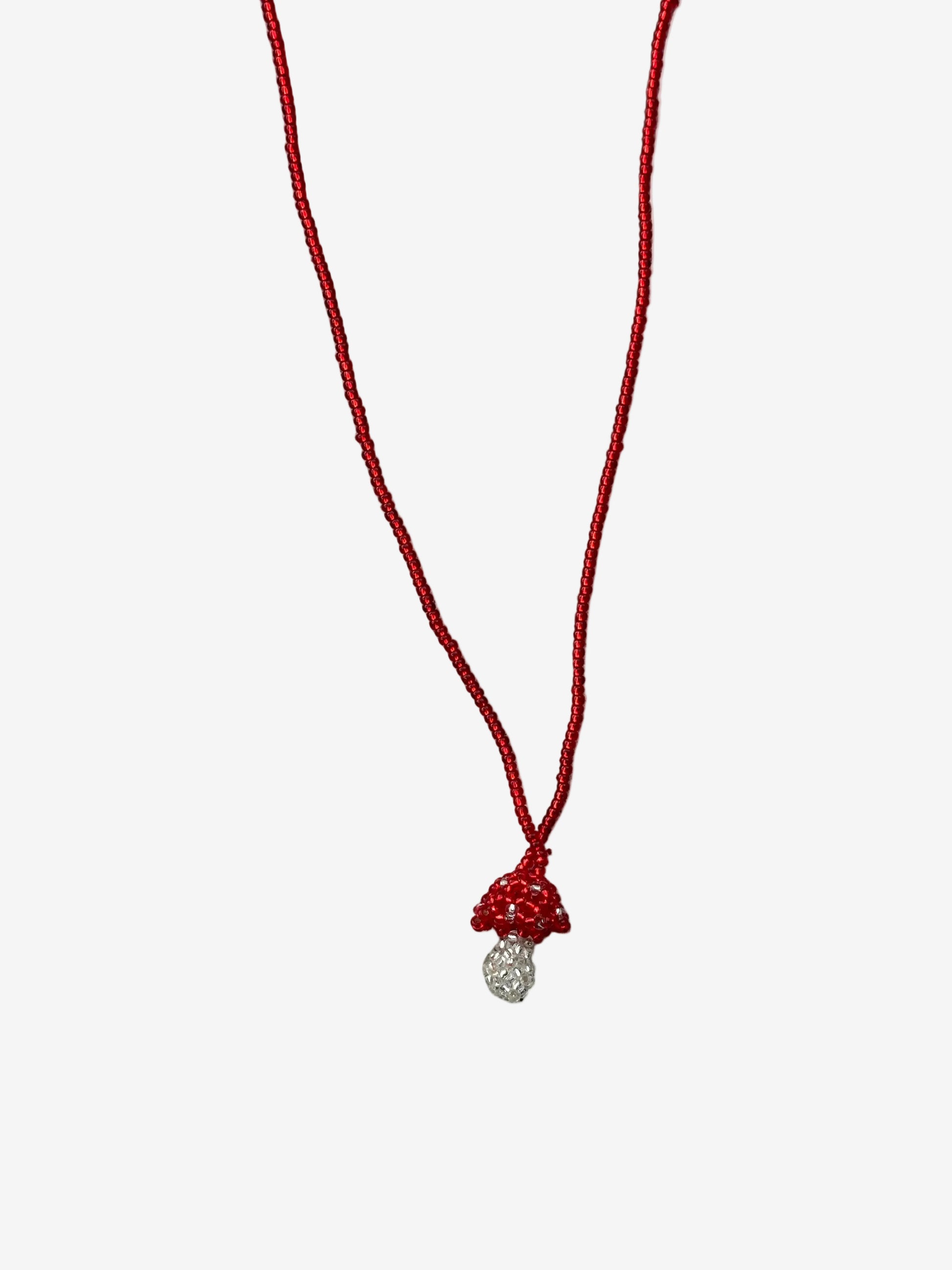 Small red and clear fungi necklace handmade by Guava