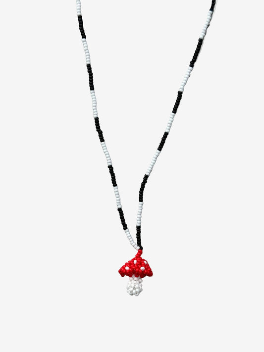 Small red and white fungi necklace with black and white chain handmade by Guava