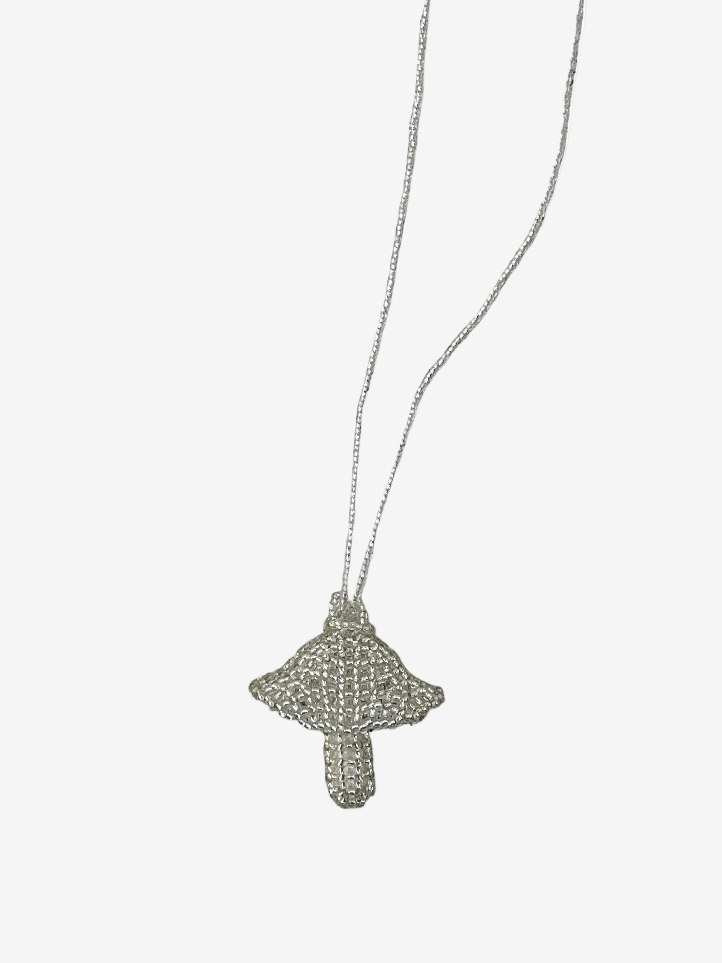 Silver fungi necklace showing metallic bead detail