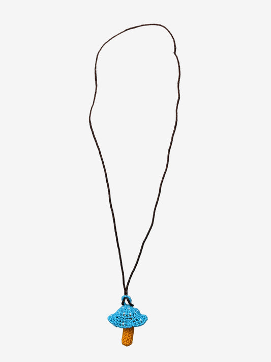 Terracap fungi necklace showing handmade bead detail